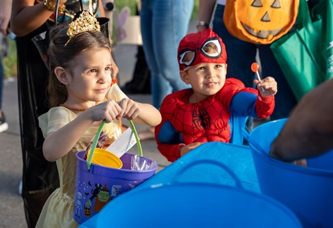 girl and boy getting candy